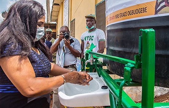 Corp member invent semi-automated hand washing machine to tackle Covid-19 in Africa