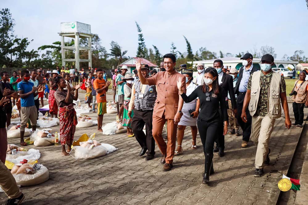 President Andry Rajoelina of Madagascar, first lady Mialy Rajoelina and other officials visiting and donating foodstuff to affected families