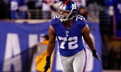 Osi Umenyiora fully kitted for a football game (Photo credit: Sportscasting)