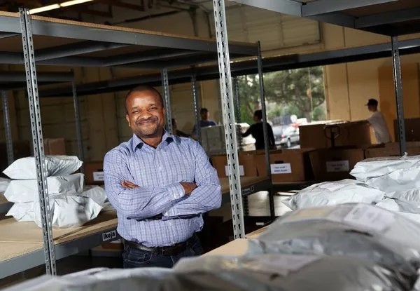 Chris Folayan in his warehouse (Photo credit: Sunday Adelaja's Blog)