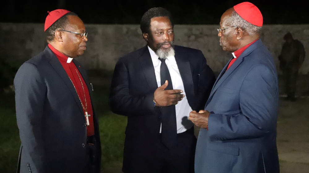 Kabila talks with religious leaders after a meeting with coalition membersPresident Joseph Kabila