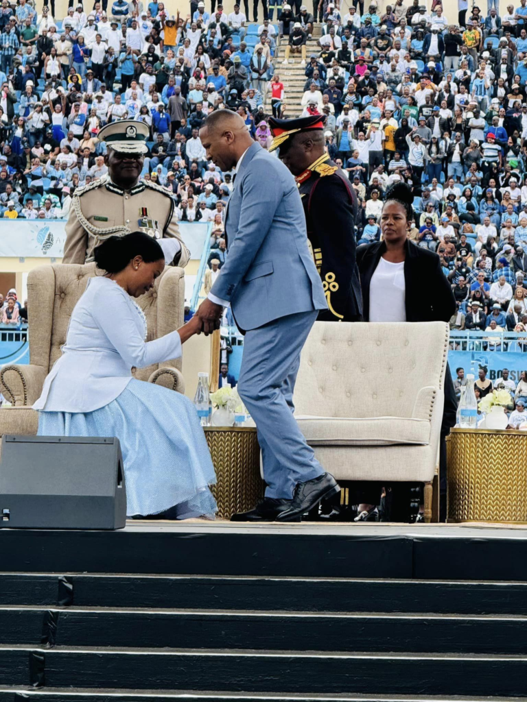 President Duma Boko holds hands of First Lady Kaone Boko during inauguration