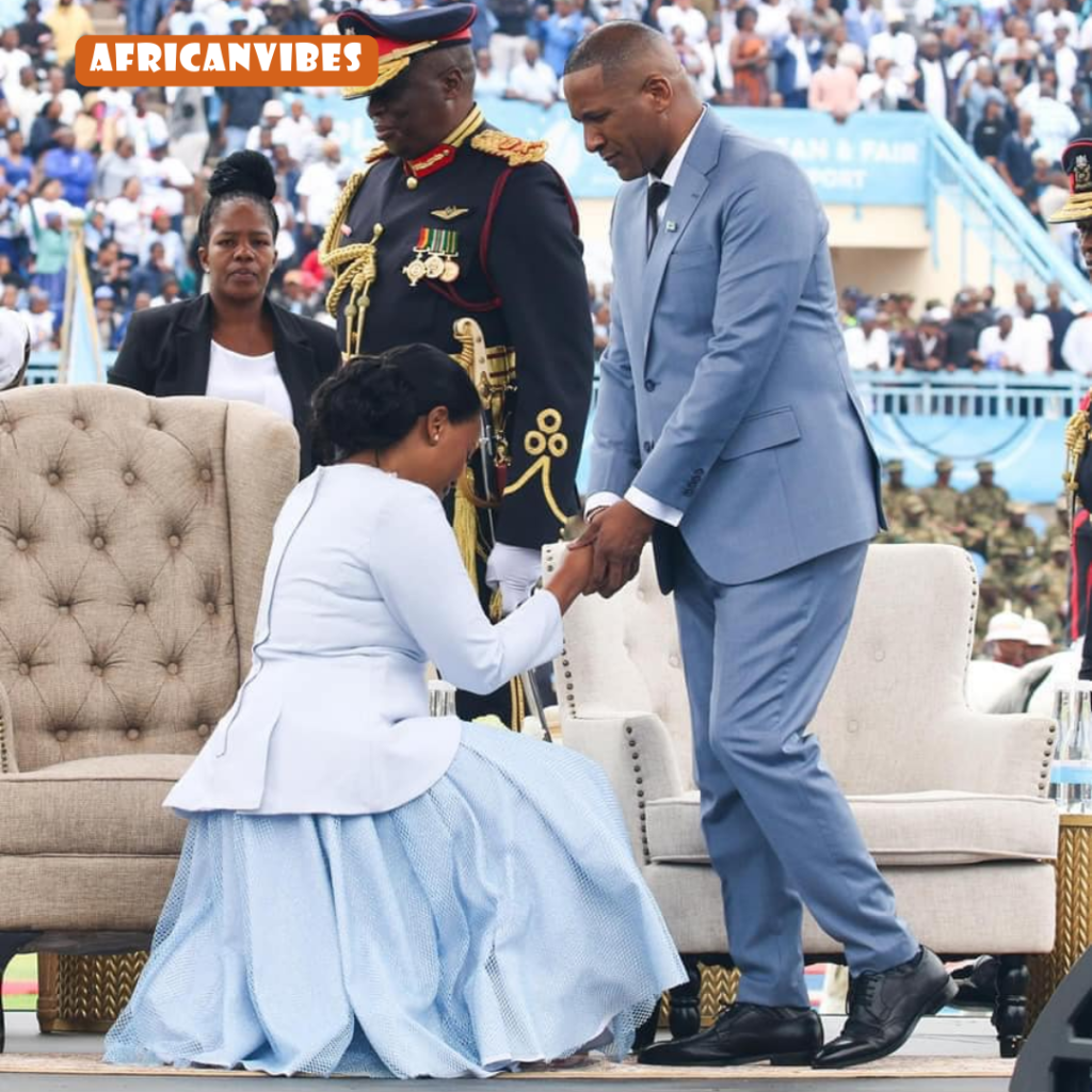 Botswana First lady kneeling at inauguration ceremony