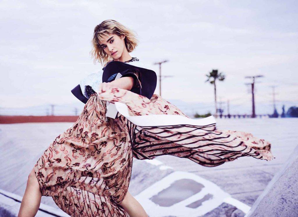 Afronista Spotlight: Did You Know This Famous Hollywood Star Sofia Boutella From Algeria? 8 Posing like a pro in a chic brown and black ensemble